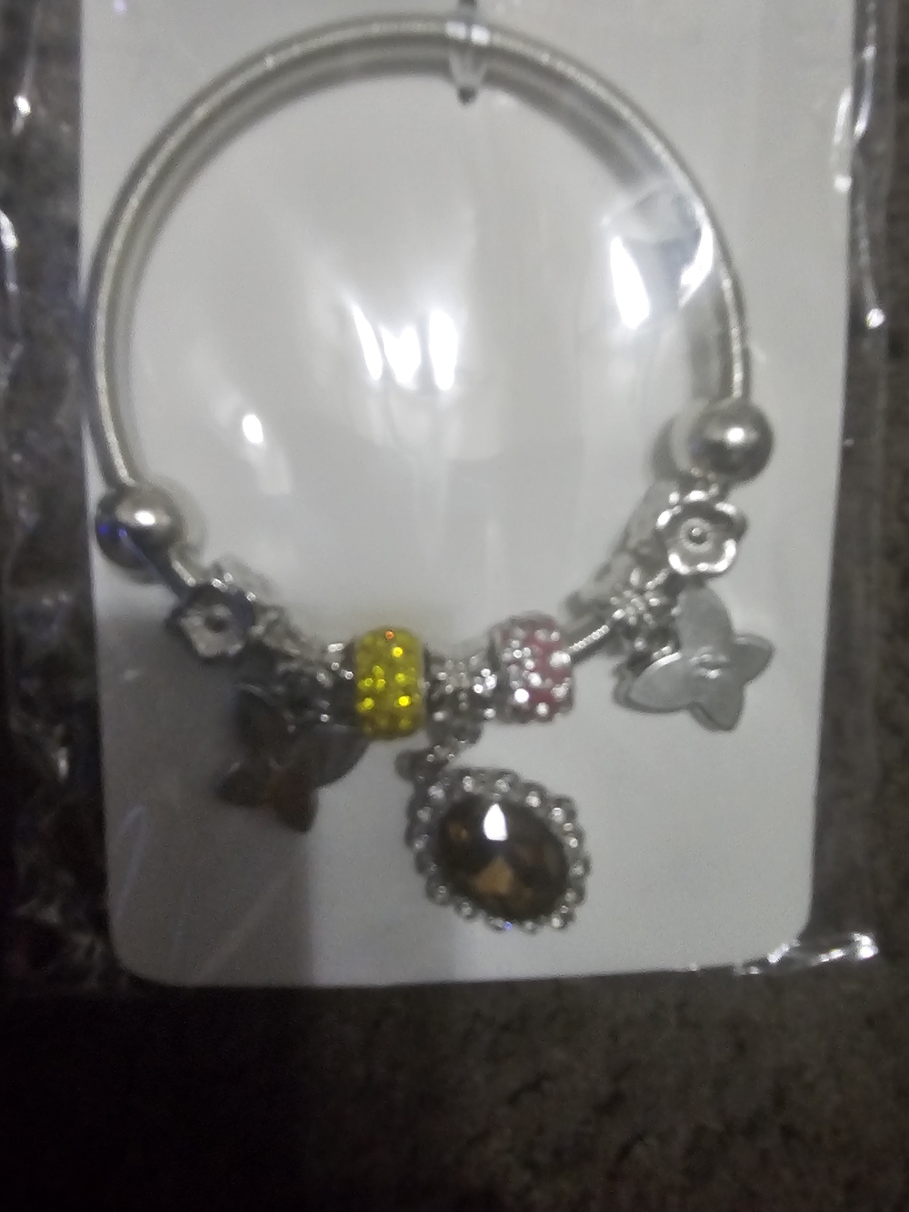 Silver Charm Bracelet with Yellow and Pink Accents